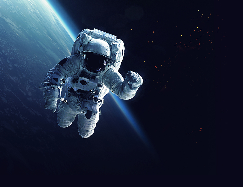 nasa astonaut in space with Earth in the background