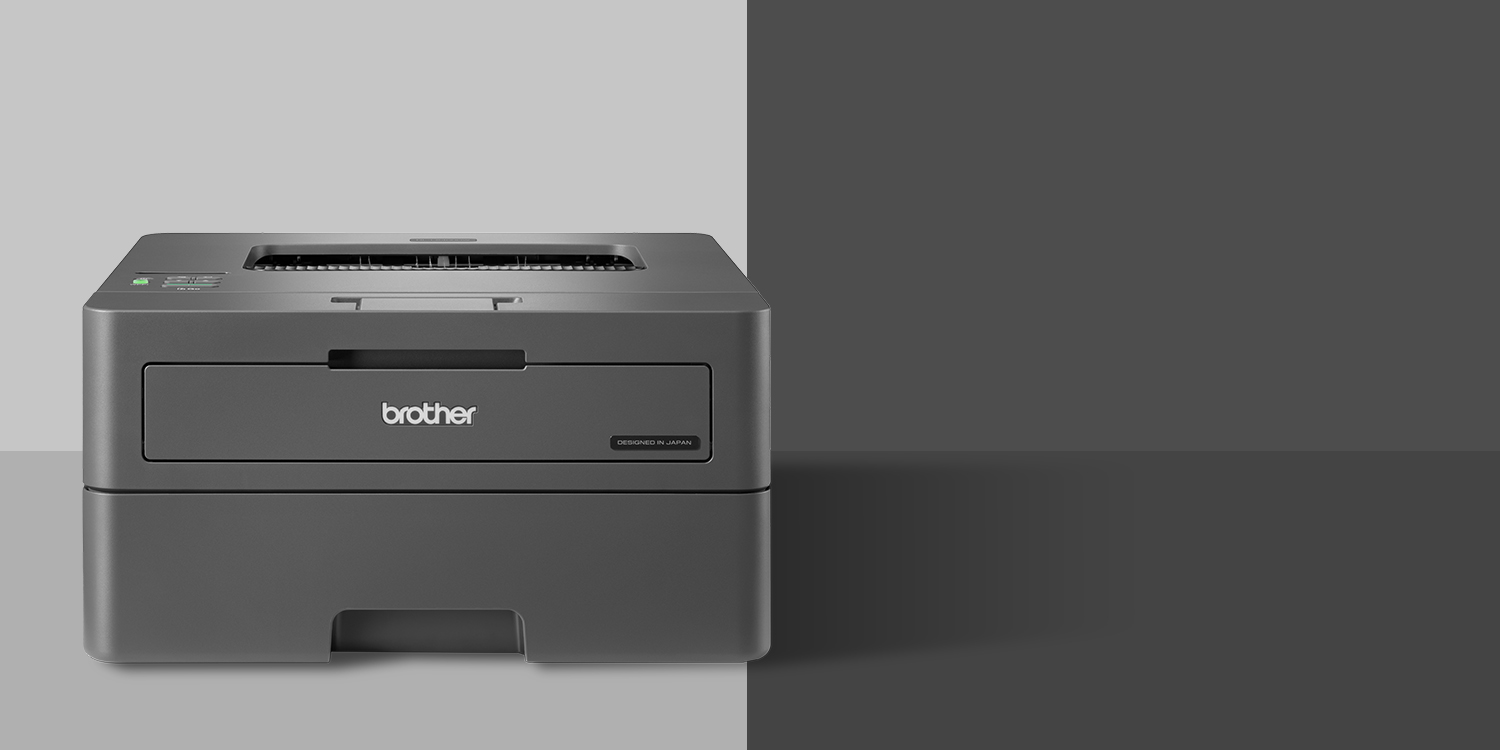 Brother monochrome laser printer on a grey and dark grey background